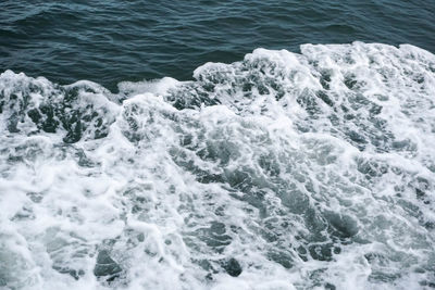 High angle view of waves in sea