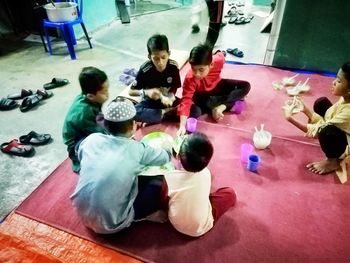 High angle view of people on floor