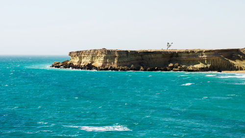 Scenic view of sea against clear sky