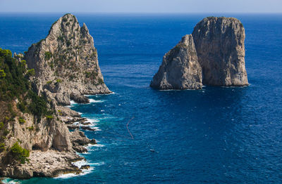 Amazing faraglioni cliffs panorama with the tyrrhenian sea in background capri island campania