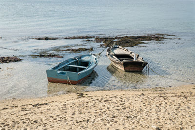 Small wooden boat on the beach called chalana a typical small vessel from rias baixas galicia, spain