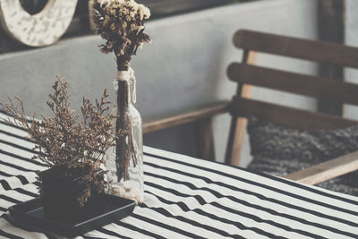 Close-up of flower vase on table