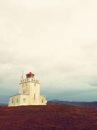 Low angle view of lighthouse against sky