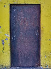 Close-up of rusty metal door