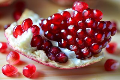 Close-up of pomegranate seeds on table