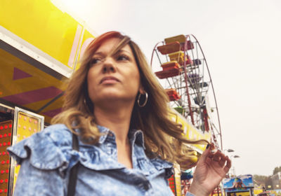 Portrait of young woman looking away