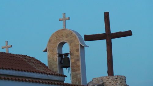 Bell tower against blue sky