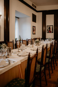 Decorated table at a wedding venue. restaurant, chairs, tablescape.