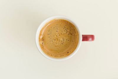 High angle view of coffee against white background