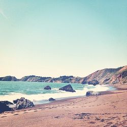 Scenic view of sea against clear sky