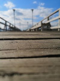 Surface level of bridge against sky