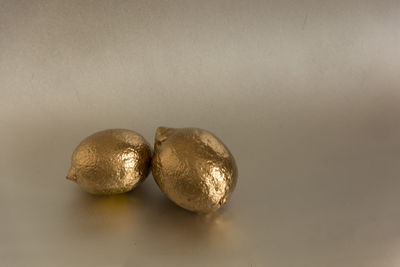 Close-up of bread over white background