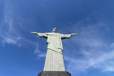 Low angle view of christbthe redeemer against blue sky