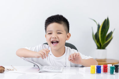 Portrait of cute boy smiling