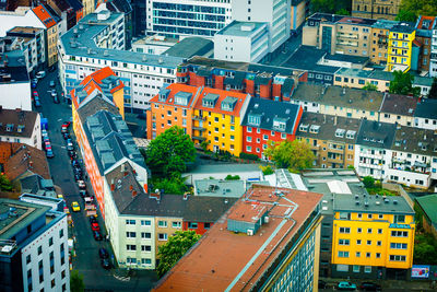 High angle view of street amidst buildings in city