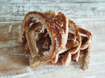 High angle view of bread on cutting board