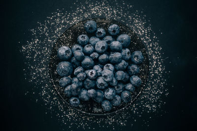 High angle view of blueberries in bowl