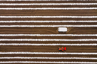 Aerial view of cultivated agricultural field in spring