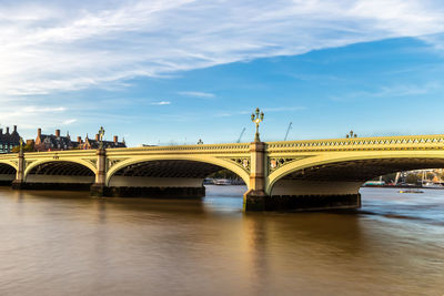 Arch bridge over river