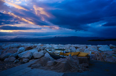 Scenic view of sea against sky at sunset