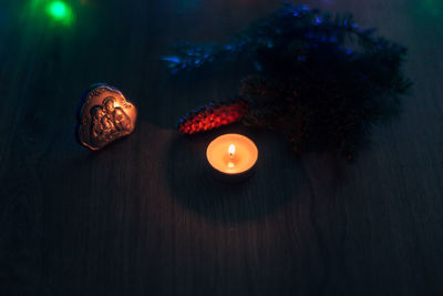 Close-up of illuminated christmas lights on table