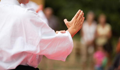 Cropped image of woman practicing karate