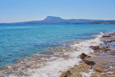 Scenic view of sea against clear sky