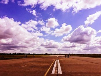 Road against cloudy sky