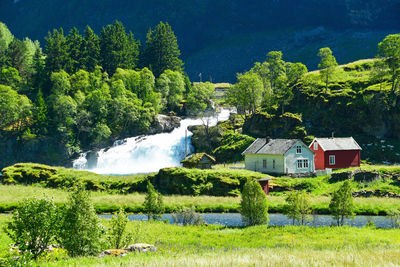 Countryside farm with waterfall at flam norway