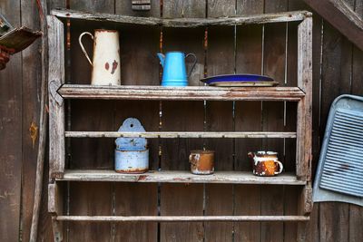 Abandoned wooden rack on wall