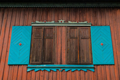 Closed wooden window of house