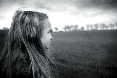 Close-up of woman on field