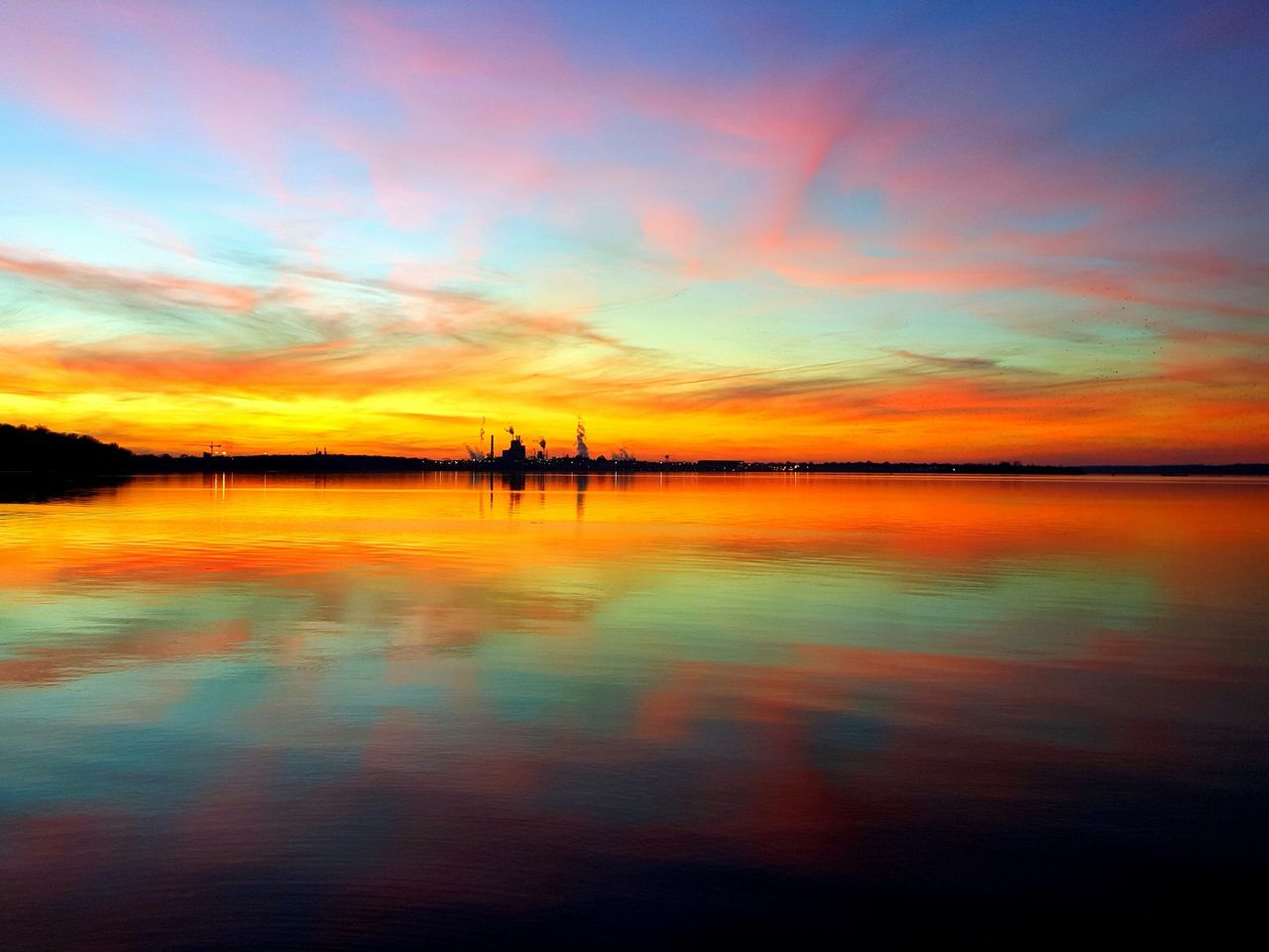 sunset, water, orange color, scenics, tranquil scene, sky, tranquility, beauty in nature, reflection, silhouette, cloud - sky, idyllic, waterfront, lake, nature, dramatic sky, cloud, sea, moody sky, calm