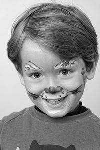 Close-up portrait of smiling boy