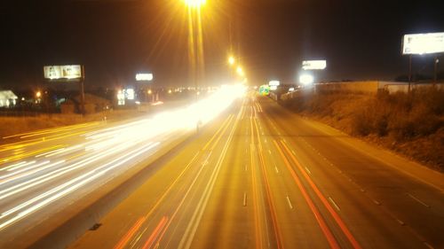 Light trails on road at night