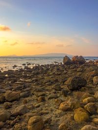 Scenic view of sea against sky during sunset