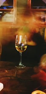 Close-up of wine glass on table in restaurant