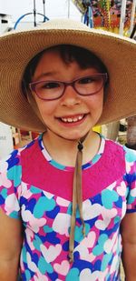 Portrait of smiling girl wearing hat