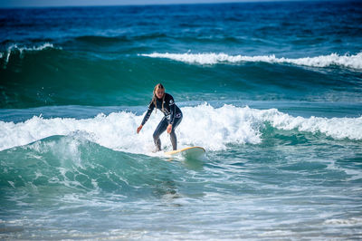 Man surfing in sea