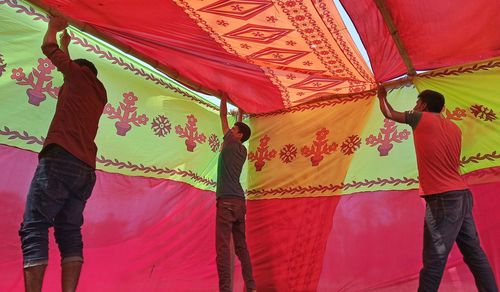 Rear view of people in traditional clothing