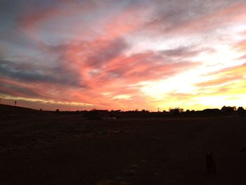 Scenic view of dramatic sky during sunset