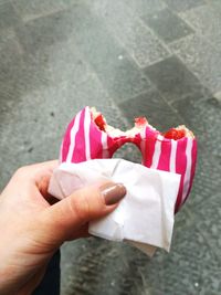 Close-up of hand holding umbrella