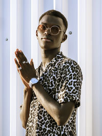 Portrait of young woman wearing mask