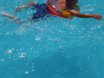 Woman swimming in pool