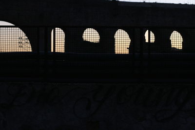 Low angle view of illuminated building at night