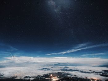 Scenic view of star field against sky at night