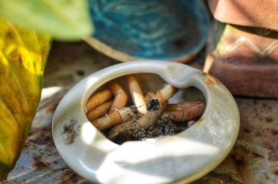 High angle view of cigarette on table