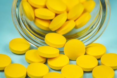 Close-up of yellow eggs on table