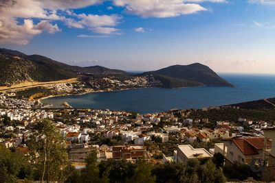 High angle view of townscape by sea