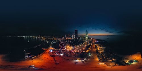 High angle view of illuminated city at night